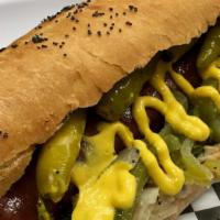 Maxwell Street Polish Sausage · A grilled 1/4 lb Polish kielbasa topped with grilled onions & peppers, yellow mustard, and s...