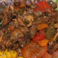 Brown Stew Chicken Salad · Top off your salad with our Brown Stew Chicken. Chicken breast, thighs and carrots cooked do...
