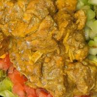 Curry Chicken Salad · Top off your salad with our zesty Curry Chicken! Add your favorite toppings and savor the fl...
