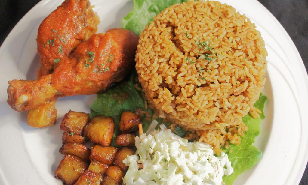 Jollof Rice · Served with coleslaw, plantains, and your choice of chicken, beef, or fish.