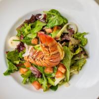Lobster Salad · Steamed fresh maine lobster atop mixture of heart of palms and baby field greens with shrimp...