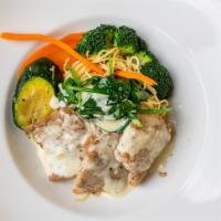Veal Bellini · Sautéed with spinach in a cream sauce.