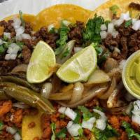 Tacos (3) · Your choice of different proteins and toppings for each taco.