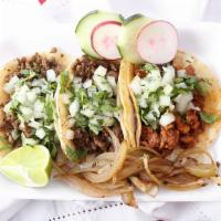 Taco Sampler · Try all our meats with the taco sampler, one of each- carne asada, chicken, al pastor, cabez...