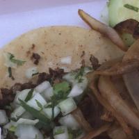 Cabeza Taco · Cow cheek, cilantro, onion.