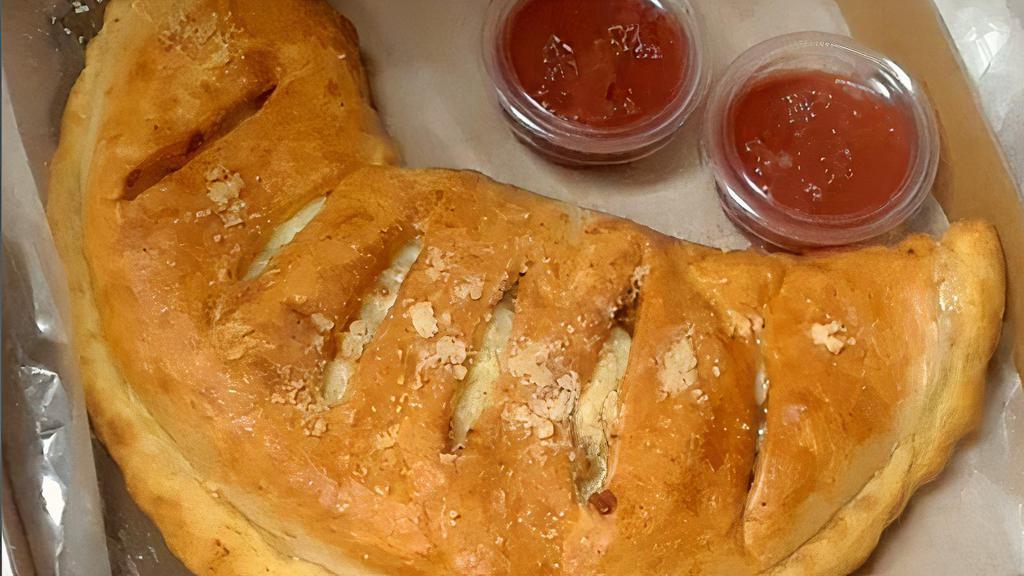 Original Stromboli · Our secret recipe pizza sauce, ground beef and our special blend of 100% fresh natural cheese wrapped in our fresh, never frozen dough.