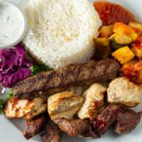 Mixed Grill · Shish taouk, lamb kebab, kafta, vegetables, rice pilaf.