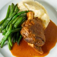 Lamb Osso Bucco · Roasted garlic mashed potatoes, demi-glace.