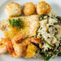 Broiled Mediterranean Seafood Combo · Filet branzino, scallops, shrimp, spanakorizo, toasted pine nuts.