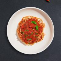 Spaghetti · Fresh spaghetti served with a red sauce.