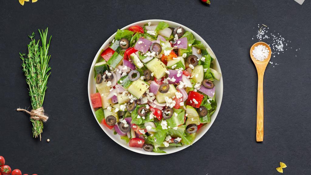 Greek Salad · Tomatoes, cucumber, onion, and olives tossed with your choice of dressing.