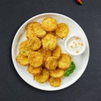Fried Pickles · (Vegetarian) Fresh dill pickles sliced length-wise into quarters, breaded, and fried until g...