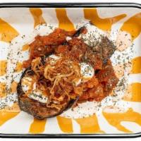 Borani Bademjan · Grilled eggplant in tomato sauce topped with yogurt and dried mint. (Vegetarian, Gluten Free...