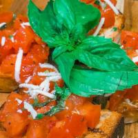 Bruschetta · rustic bread, marinated tomato, garlic, basil