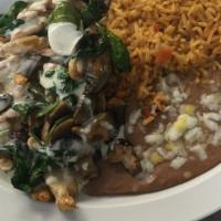 Lunch El Popeye · Grilled chicken strips cooked with spinach and mushrooms, topped with cheese sauce. Served w...