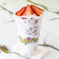 Medium Strawberries And Cream  · Sliced Strawberries with vanilla whipped cream mixed with pecan bits and our house made swee...