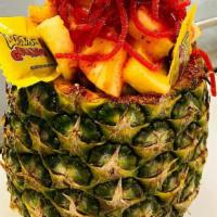 Crazy Pineapple  · Carved out pineapple, filled with all our fruits covered in chamoy and tajin, topped with ch...
