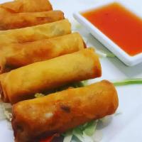 Spring Rolls · Mixed vegetables wrapped in thin spring roll paper then gently deep fried with a house made ...