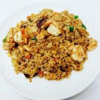 Combo Fried Rice · Steamed rice stir-fried in a wok with chicken, shrimp, beef, onions, peas, green beans, carr...