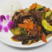 Beef Yasai · Beef sautéed with assorted vegetables in brown sauce. Served with choice of side, and steame...
