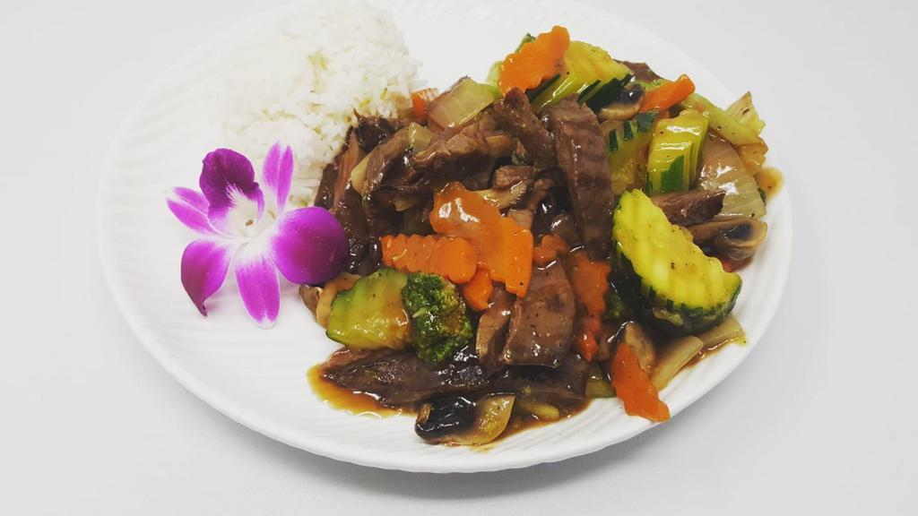 Beef Yasai · Beef sautéed with assorted vegetables in brown sauce. Served with choice of side, and steamed rice