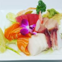 Sashimi Deluxe · 18 chef choice pieces of the finest sashimi .