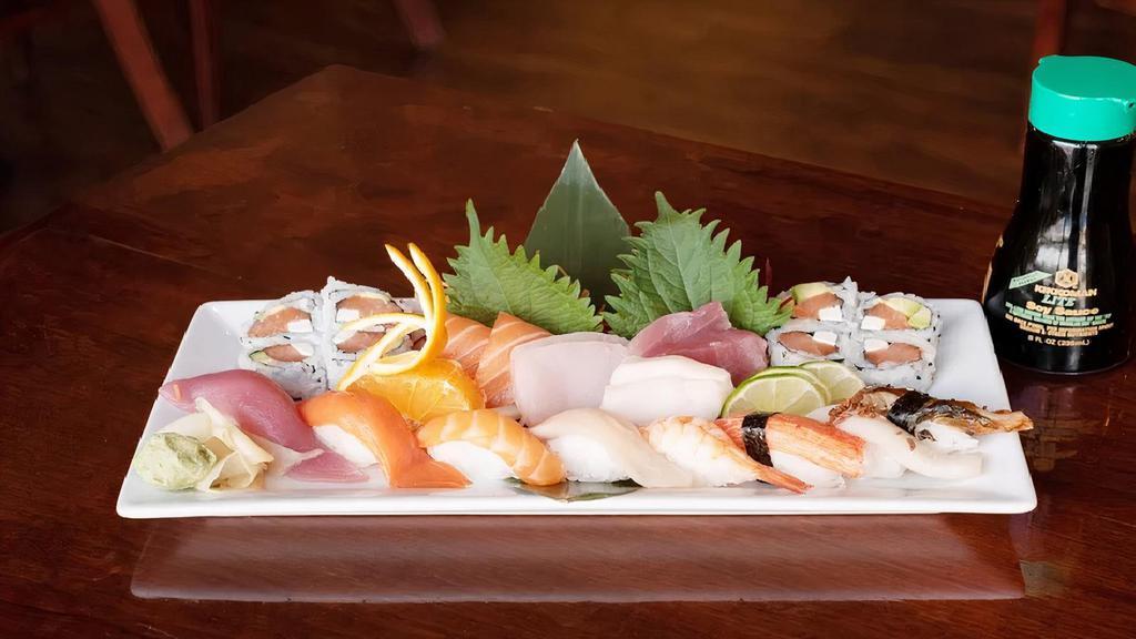 Sushi & Sashimi Combo · Assorted 8 pieces of sashimi and 8 pieces of sushi with Philadelphia roll.