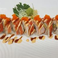 Shaggy Dog Roll · Shrimp tempura, avocado, cream 
cheese and cucumber topped with 
crab meat, masago with spic...