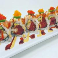 Mi Amor Roll · Shrimp Tempura, Spicy tuna, 
Avocado, and Tempura flakes 
topped with salmon, shrimp 
masago...