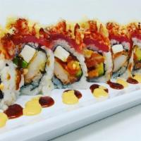 Blanco Cross Roll · Shrimp tempura, spicy salmon, 
avocado, cucumber and cream 
cheese topped with fresh tuna an...