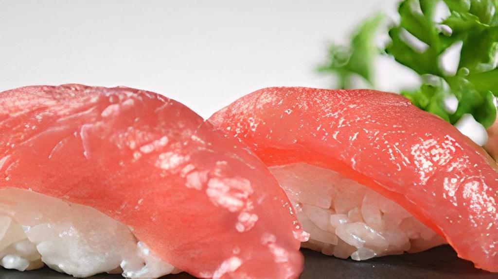 Ahi Tuna Sushi · 2 pieces of Sliced Ahi Tuna on sushi rice.