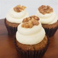 24 Karat Cupcake · With cream cheese icing and a candied walnut.