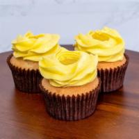 Lemon Cupcake · With lemon buttercream and lemon curd.
