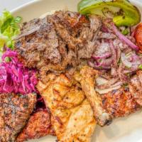 Chef'S Mix Grill · Spicy, Gluten Free.

Chef's combination meat platter served with rice and salad.