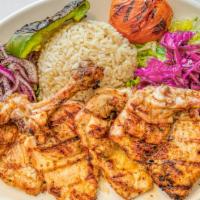 Chicken Chops · Gluten free. Marinated char-grilled chicken thigh served with rice and salad.
