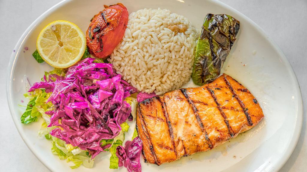 Salmon · Gluten Free.

Char-grilled fresh fillet Atlantic salmon served with rice or salad.