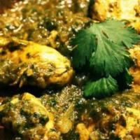 Chicken Saag · Marinated chicken in a creamy spinach and kale curry sauce.