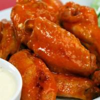 Chicken Wings (8) · Choice of sauce: Breaded, Buffalo, Cajun, Lemon Pepper, BBQ, Thai Sweet Chili.