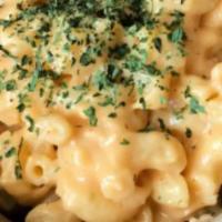 Mac And Cheese · The most delicious cheesiest mac and cheese you've had.