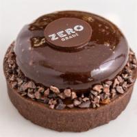 Origin Tart · Chocolate hazelnut cake, chocolate hazelnut cremeux, milk chocolate mousse with dark chocola...