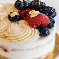 Berry Charlotte · Almond sponge cake with mascarpone cream and fresh berries