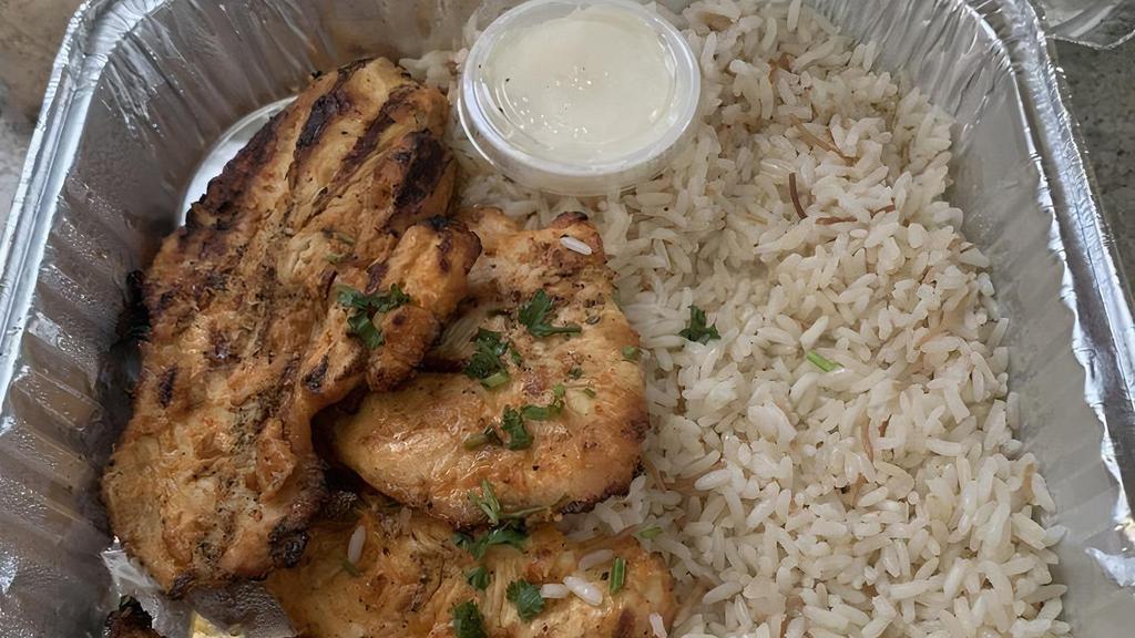 Chicken Ghallaba · Tips of chicken, sautéed with vegetable carrots, green peppers, onions, tomatoes, mushrooms, and special seasonings. Served with your choice of rice or fries and soup or house salad.
