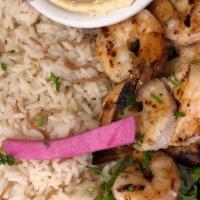Shish Shrimp Dinner · Marinated shrimp charbroiled and served with hummus. Includes your choice of rice or fries a...