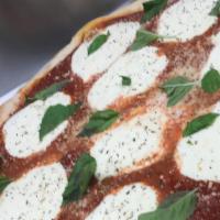 Margherita · Chunky tomato sauce, fresh mozzarella & basil