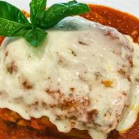 Lasagna · Homemade meat & cheese lasagna
