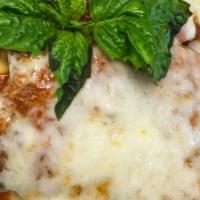 Chicken Parmigiana · A Classic! Our tomato sauce,mozzarella and Parmesan cheese.