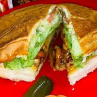 Torta/Pastor · Pork marinated with Mexican herbs adobo sauce and pineapple, All the Tortas come with french...
