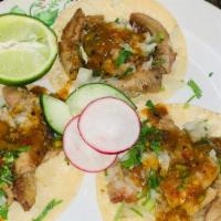 Tripa · Beef tripe, Each taco comes with corn tortilla's, Served with cilantro, raw and grilled onio...