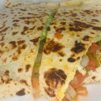 Q/Veggie · Quesadilla comes with grilled cactus and cilantro. Also comes with mozzarella cheese, avocad...
