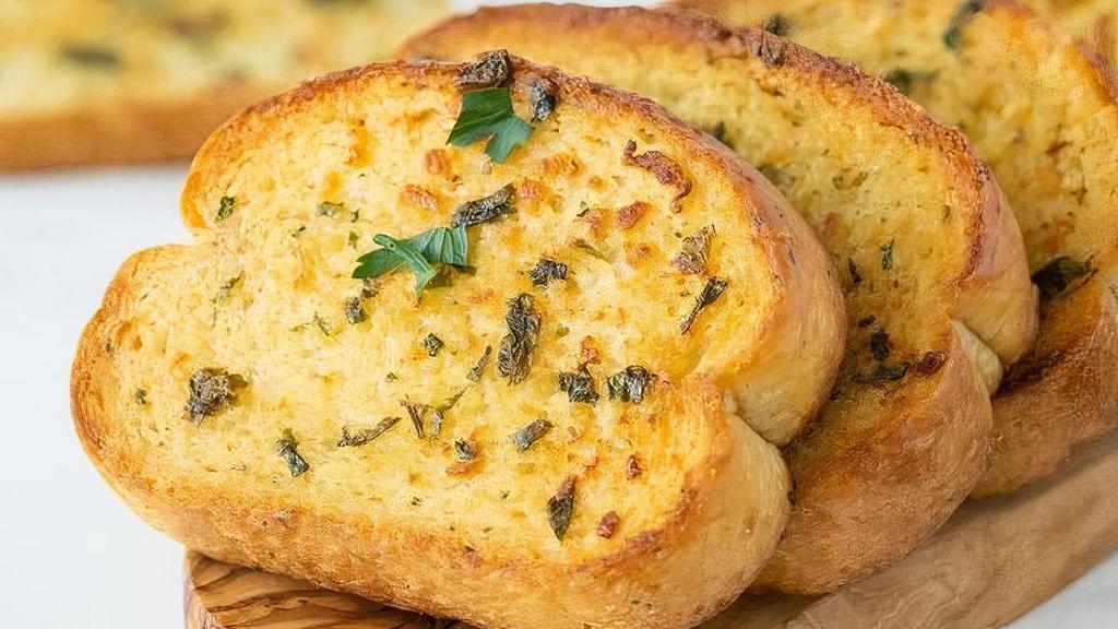 Garlic Bread · Bread topped with garlic and olive oil.